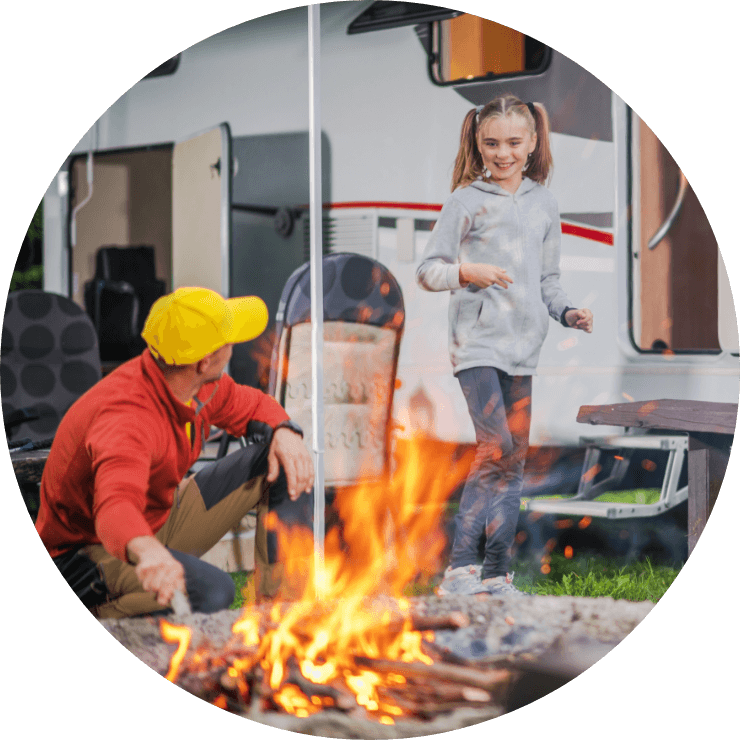 Family enjoying campfire