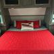 Real King size bed on East to West travel trailer @ Triangle RV